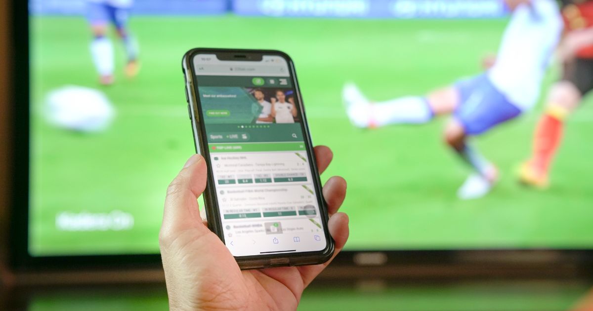 Sports betting with phone and tv