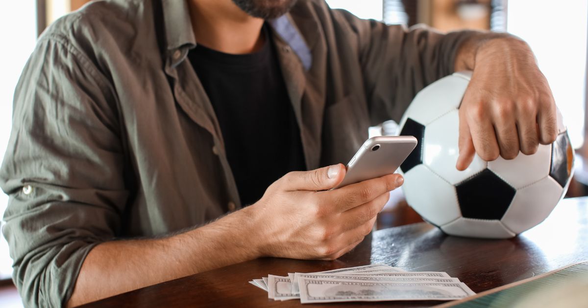 ball, money, and man holding iphone